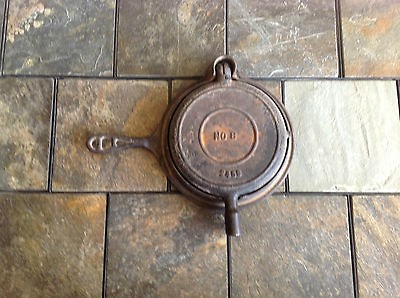 VINTAGE BRILLIANT NO. 8 CAST IRON WAFFLE MAKER.