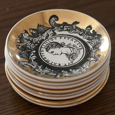 Fornasetti Profili Romani set of 8 gilded small plates RARE