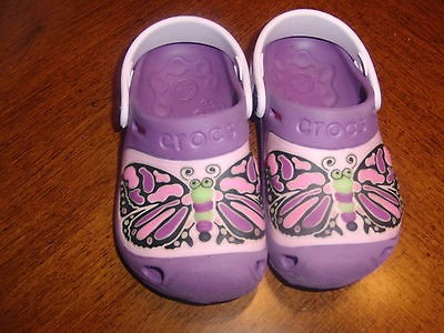 CROCS GLOW IN THE DARK BUTTERFLY CLOGS, Purple, Sz 8 9