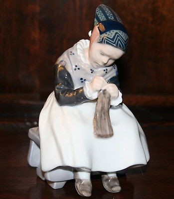 ROYAL COPENHAGEN FIGURINE OF AMAGAR GIRL KNITTING MODEL No. 1314 BY 