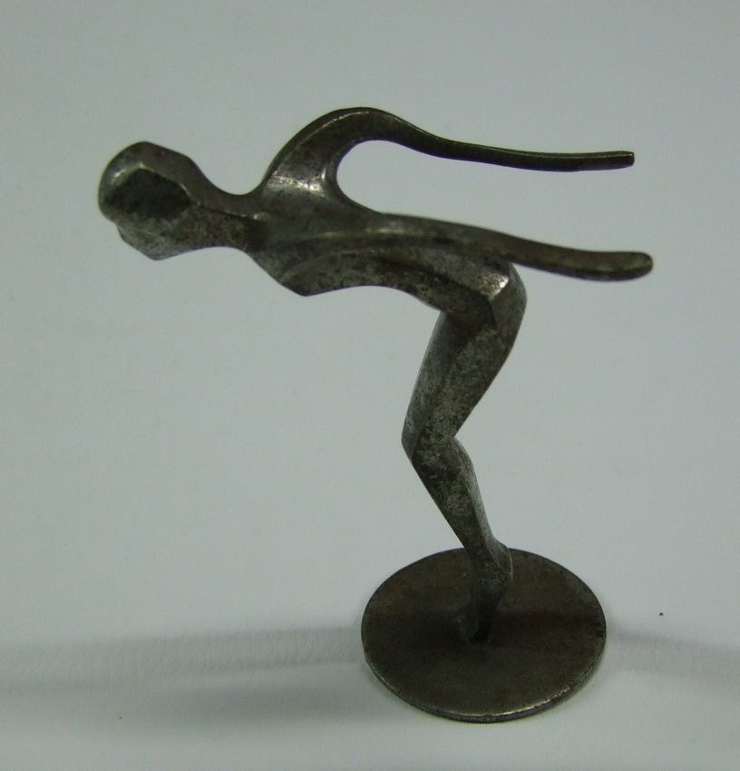 ART SCULPTURE AUSTRIA SKIER,WHITE METAL SIGNED