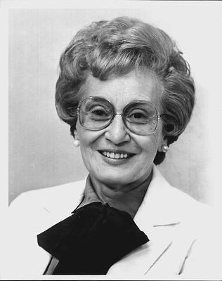 Mrs Fred Langone wearing glasses light jacket and dark scarf Press 