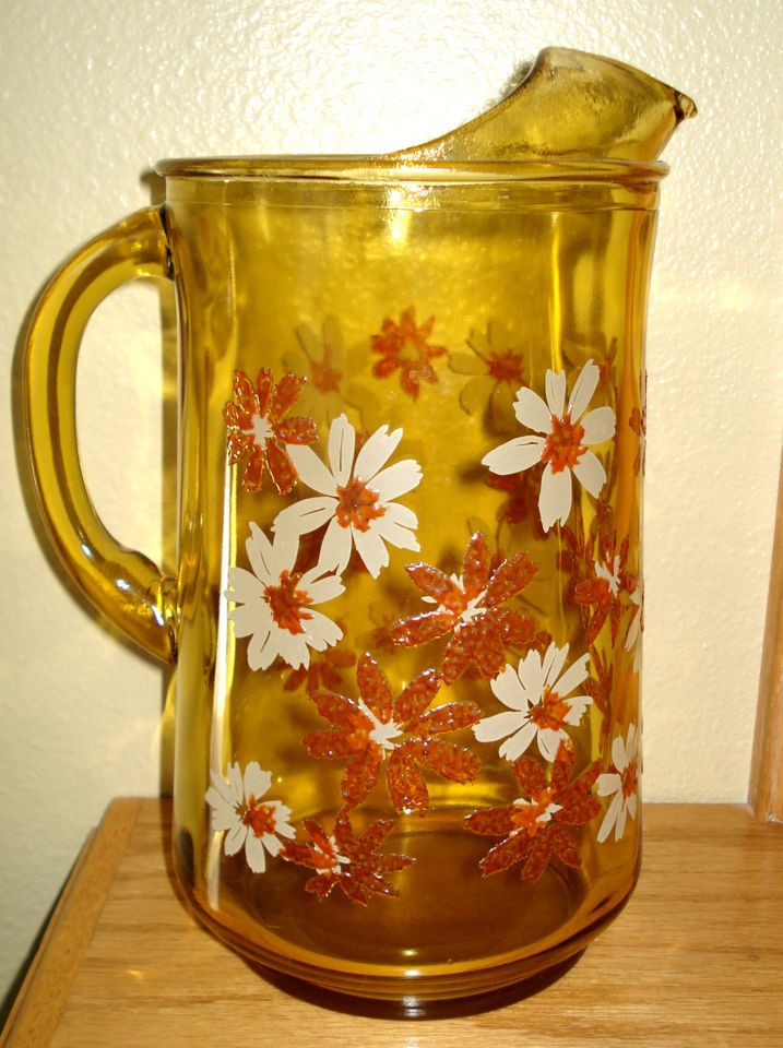 VINTAGE~AMBER GLASS Pitcher w/Painted Embossed Daiseys  10 1/2 tall 