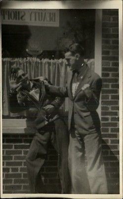   Shop Buddy Pretends to Punch 1950s Greaser Type Leather Jacket RPPC