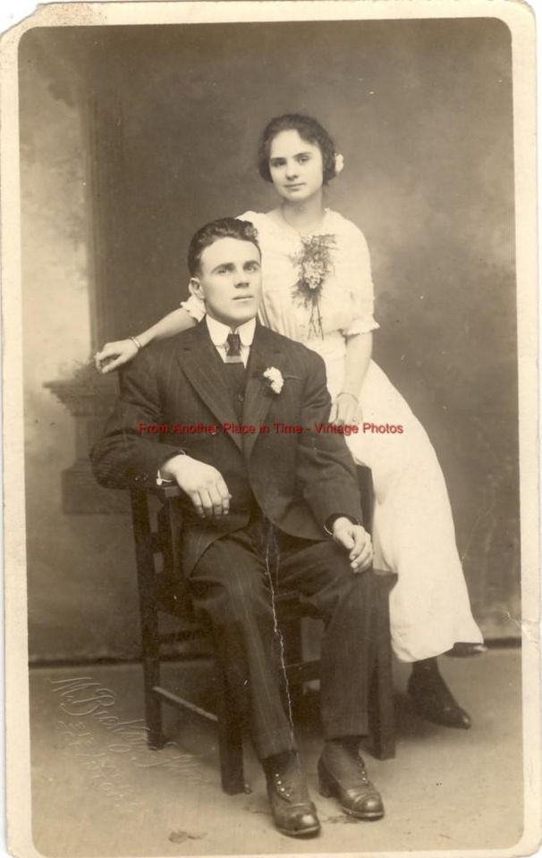 vintage postcard photo couple in studio scranton pa time left