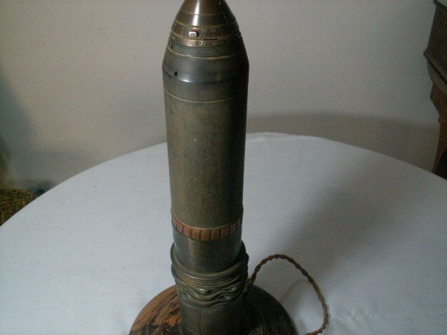 Old Trench art shell converted to lamp shell crushed lower half dated 