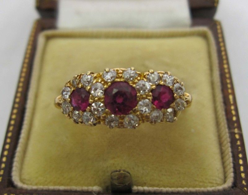 SUMPTIOUS Victorian Rubies and Diamonds 18ct Triple cluster Ring