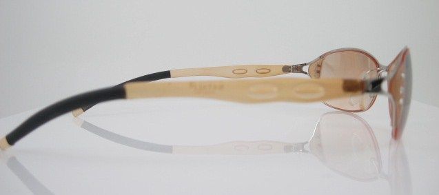 you are bidding on a pair of batali tan frameless rhinestone 