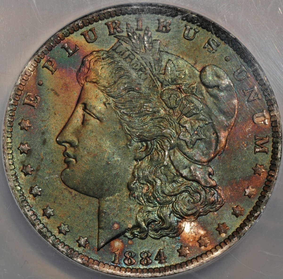 1884 O Morgan Dollar Binion NCS Genuine Rainbow Bag Toned ~COLORFUL 