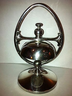 antique silver plunger hotel desk dinner call bell time left