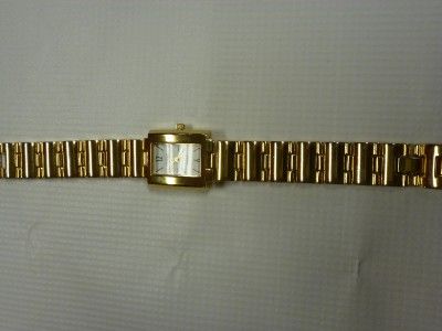 ladies carriage indiglo quartz watch with goldtone bracelet