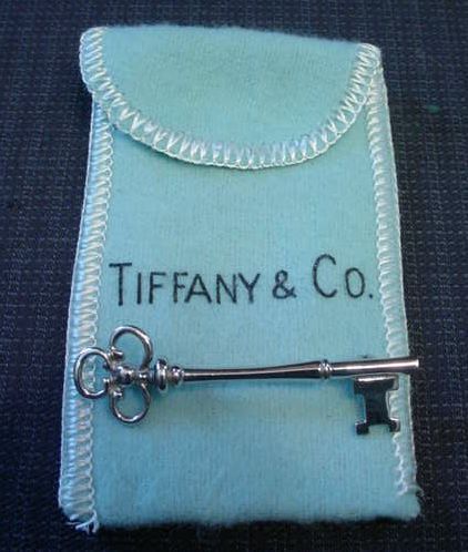 Authentic Tiffany Co Sterling Figural Key Pin w Bag