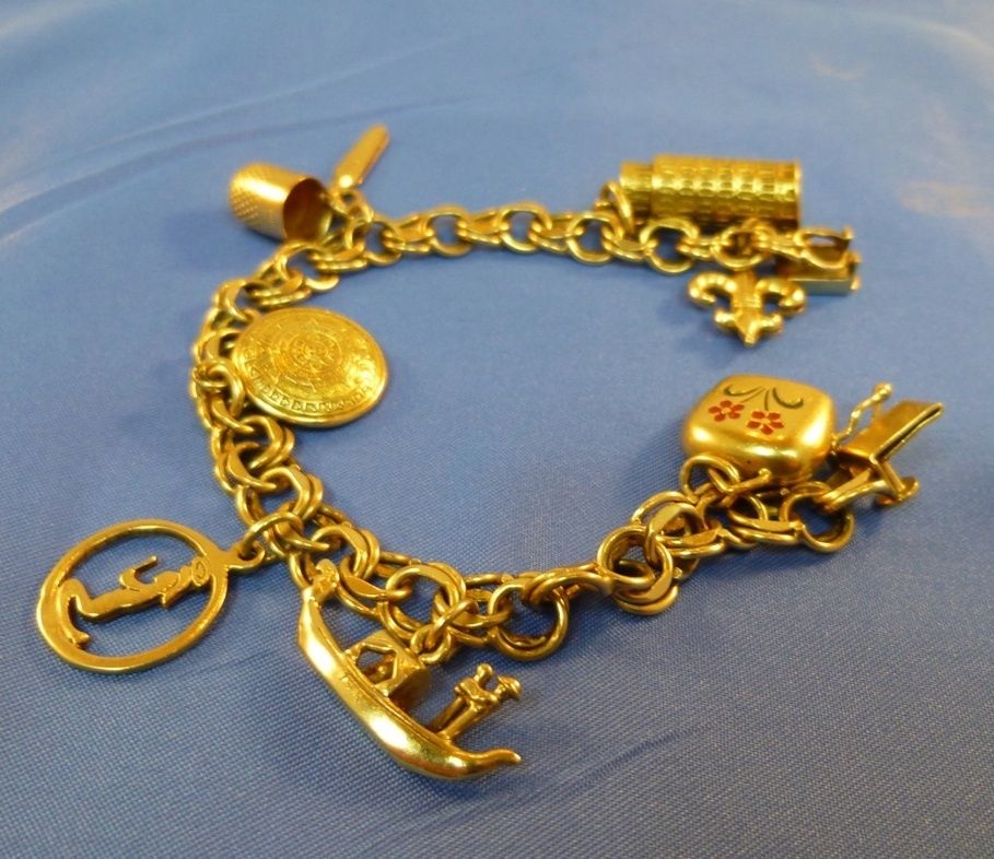  14 K Gold 8 Charm Bracelet Italy 27g