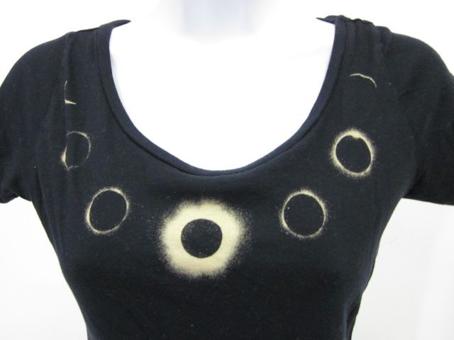 you are bidding on a edun black moon cycle print t shirt top in a size