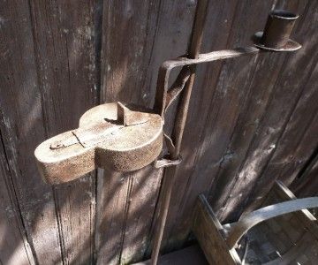 Antique Primitive Iron Floor Betty Lamp Candleholder w Heart Design