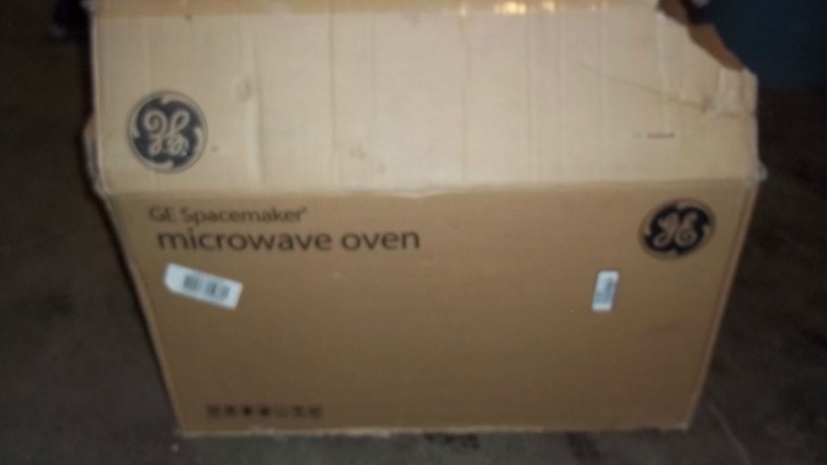 GE Spacemaker Over The Range Microwave White in Color