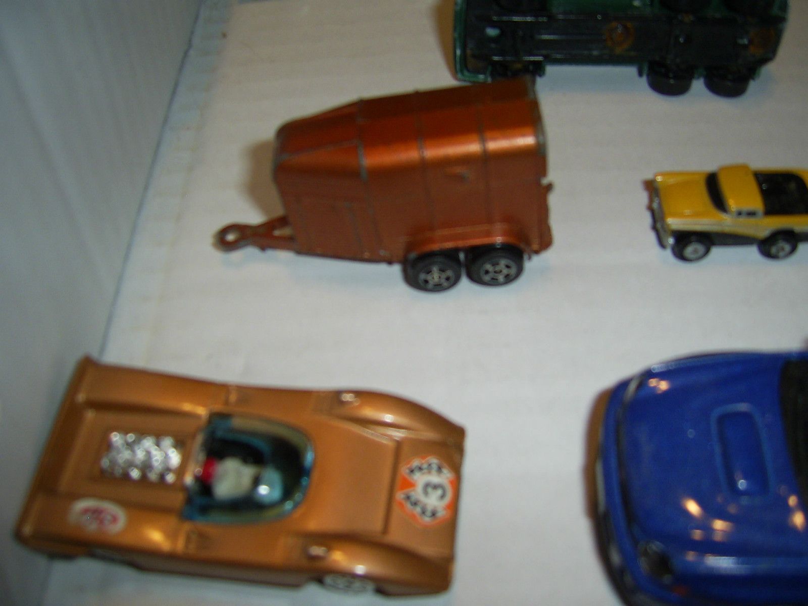 This is a nice used collection of diecast and plastic cars and trucks