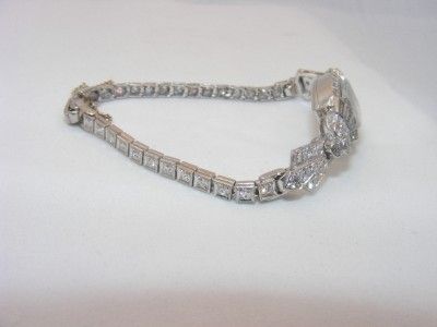 VINTAGE PLATINUM AND DIAMOND LADIES HARVEL WATCH. 2.50 C.T.T.W.