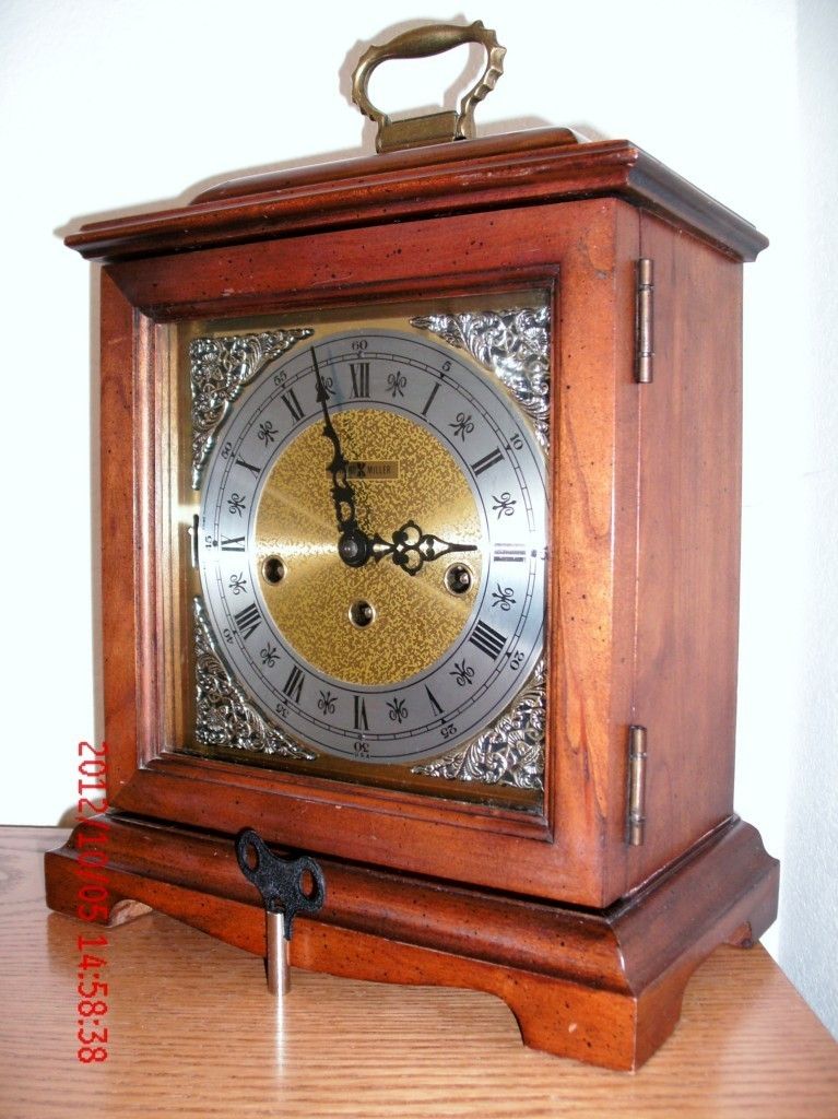 Howard Miller Mantel Clock 340 020 Chiming Germany Brass Works on PopScreen