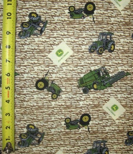 John Deere Farm Tractor Toss on Rock Wall 100% Cotton Quilt Fabric BTY