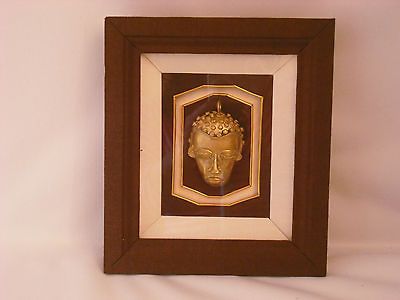 African Ashanti Brass Mask in Shadow box frame. 8 1/2 L x 7 1/2W x 1