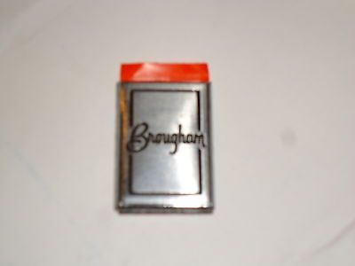 Oldsmobile BROUGHAM Metal Roof Panel Emblem NOS