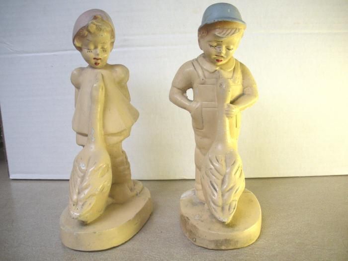 Set of 2 vintage chalk ware figurines boy w/goose & girl w/goose