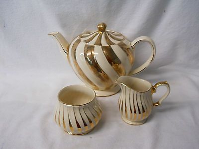 SADLER OF ENGLAND 4 PIECE TEA SET CREAM COLOR WITH GOLD STRIPES